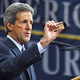 Kerry displays a test tube, which he said "holds the potential to change millions of votes."